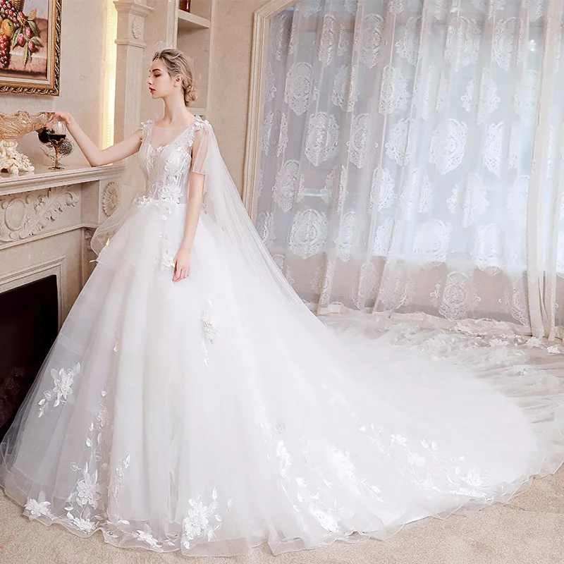 Romantic Ivory Wedding Dresses 2019 A Line Princess See Through V Neck  Sleeveless Backless Appliques Lace Watteau Train Ruffle