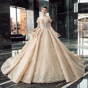 Luxury Gorgeous Champagne Wedding Dresses 2019 Ball Gown Off The Shoulder Short Sleeve Backless Appliques Lace Sequins Beading Glitter Tulle Cathedral Train