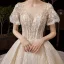 Vintage / Originale Champagne Robe De Mariée 2019 Princesse Transparentes Encolure Carrée Gonflée Manches Courtes Dos Nu Glitter Tulle Appliques En Dentelle Perlage Cathedral Train Volants