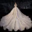 Sparkly Champagne Wedding Dresses 2019 Ball Gown Off-The-Shoulder Short Sleeve Backless Glitter Tulle Beading Cathedral Train Ruffle