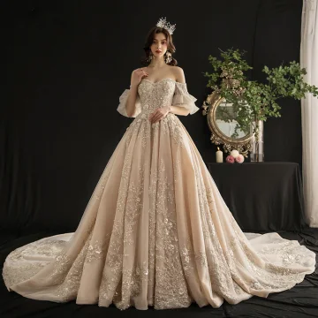 Luxe Champagne Trouwjurken 2019 A Lijn Uit De Schouder Bell Mouwen Ruglooze Appliques Kant Pailletten Kralen Kwast Cathedral Train Ruche