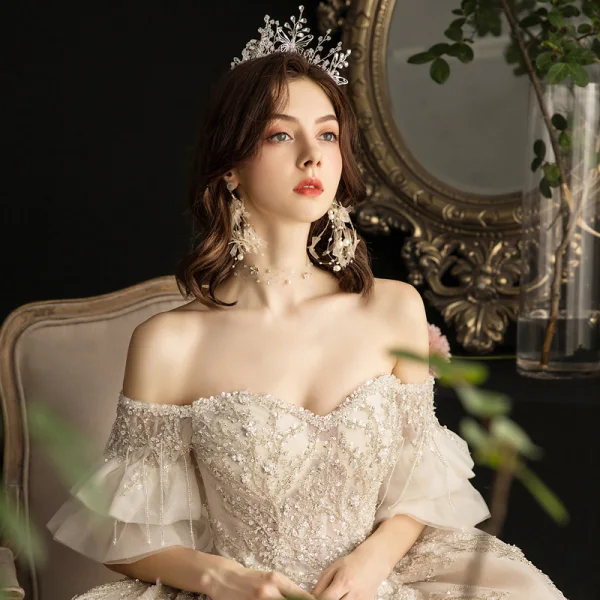 Luxury / Gorgeous Champagne Wedding Dresses 2019 A-Line / Princess Off-The-Shoulder Bell sleeves Backless Appliques Lace Sequins Beading Tassel Cathedral Train Ruffle
