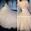 Vintage / Retro Champagne See-through Wedding Dresses 2019 Ball Gown High Neck Short Sleeve Beading Tassel Appliques Lace Glitter Tulle Cathedral Train Ruffle