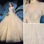 Vintage / Retro Champagne See-through Wedding Dresses 2019 Ball Gown High Neck Short Sleeve Beading Tassel Appliques Lace Glitter Tulle Cathedral Train Ruffle