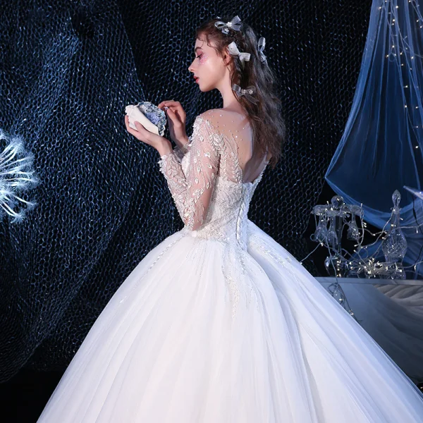 Romantique Ivoire Transparentes Robe De Mariée 2019 Robe Boule Encolure Carrée Manches Longues Dos Nu Perlage Appliques En Dentelle Cathedral Train Volants
