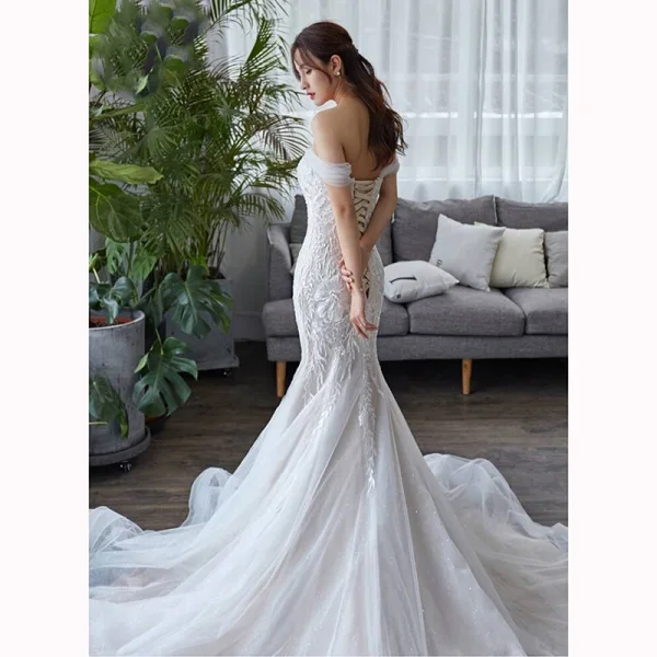 Elegant Ivory Wedding Dresses 2019 Trumpet / Mermaid Off-The-Shoulder Short Sleeve Backless Appliques Lace Chapel Train Ruffle