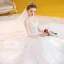 Vintage / Originale Ivoire Transparentes Robe De Mariée 2020 Robe Boule Col Haut 3/4 Manches Dos Nu Glitter Tulle Appliques En Dentelle Perlage Perle Royal Train Volants