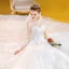 Vintage / Originale Ivoire Transparentes Robe De Mariée 2020 Robe Boule Col Haut 3/4 Manches Dos Nu Glitter Tulle Appliques En Dentelle Perlage Perle Royal Train Volants