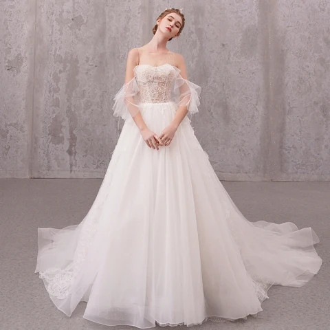 Illusion Ivory / Creme Durchsichtige Brautkleider / Hochzeitskleider 2020 A Linie Rundhalsausschnitt Kurze Ärmel Applikationen Spitze Perlenstickerei Perle Kapelle-Schleppe Rüschen