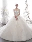 Étourdissant Ivoire Transparentes Étoile Robe De Mariée 2020 Robe Boule Col Haut Manches Longues Dos Nu Glitter Tulle Fait main Perlage Cathedral Train Volants