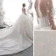 Étourdissant Ivoire Transparentes Étoile Robe De Mariée 2020 Robe Boule Col Haut Manches Longues Dos Nu Glitter Tulle Fait main Perlage Cathedral Train Volants
