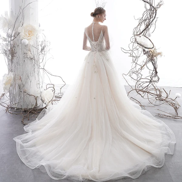 Sexy Champagne See-through Wedding Dresses 2020 A-Line / Princess High Neck Puffy Long Sleeve Appliques Lace Beading Pearl Chapel Train Ruffle