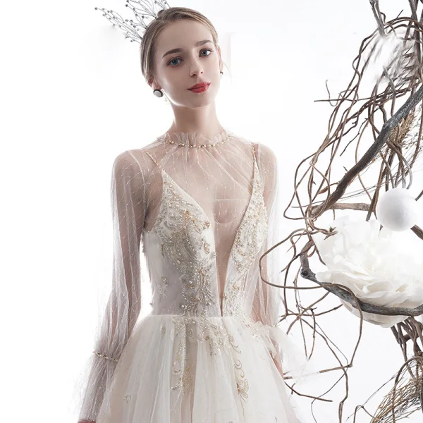 Sexy Champagne See-through Wedding Dresses 2020 A-Line / Princess High Neck Puffy Long Sleeve Appliques Lace Beading Pearl Chapel Train Ruffle