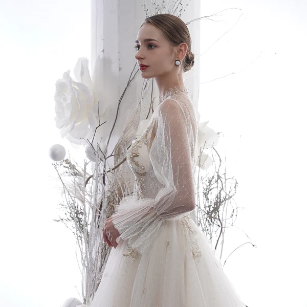 Sexy Champagne See-through Wedding Dresses 2020 A-Line / Princess High Neck Puffy Long Sleeve Appliques Lace Beading Pearl Chapel Train Ruffle
