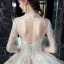 Illusion Champagne Transparentes Robe De Mariée 2020 Robe Boule Col v profond 3/4 Manches Dos Nu Glitter Tulle Appliques En Dentelle Perlage Cathedral Train Volants