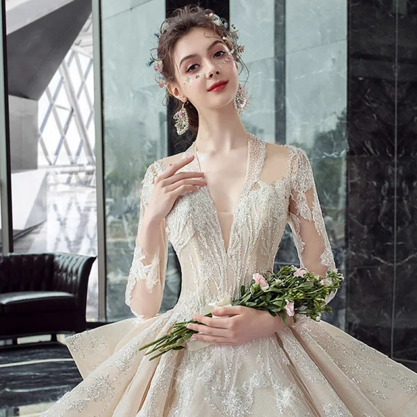 Illusion Champagne Transparentes Robe De Mariée 2020 Robe Boule Col v profond 3/4 Manches Dos Nu Glitter Tulle Appliques En Dentelle Perlage Cathedral Train Volants
