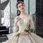 Illusion Champagne Transparentes Robe De Mariée 2020 Robe Boule Col v profond 3/4 Manches Dos Nu Glitter Tulle Appliques En Dentelle Perlage Cathedral Train Volants