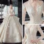 Illusion Champagne Transparentes Robe De Mariée 2020 Robe Boule Col v profond 3/4 Manches Dos Nu Glitter Tulle Appliques En Dentelle Perlage Cathedral Train Volants