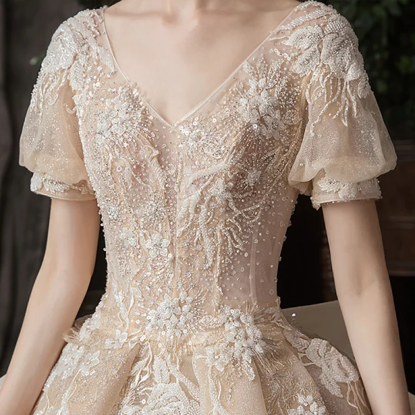 Victorian Style Champagne Wedding Dresses 2020 Ball Gown V-Neck Puffy Short Sleeve Backless Glitter Tulle Appliques Lace Beading Royal Train Ruffle