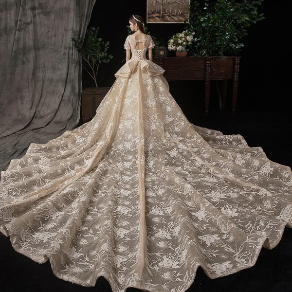 Victorian Style Champagne Wedding Dresses 2020 Ball Gown V-Neck Puffy Short Sleeve Backless Glitter Tulle Appliques Lace Beading Royal Train Ruffle