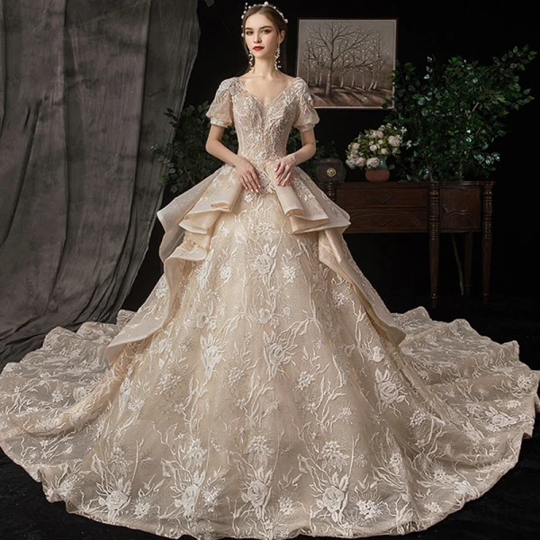 Victorian Style Champagne Wedding Dresses 2020 Ball Gown V-Neck Puffy Short Sleeve Backless Glitter Tulle Appliques Lace Beading Royal Train Ruffle