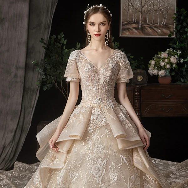 Victorian Style Champagne Wedding Dresses 2020 Ball Gown V-Neck Puffy Short Sleeve Backless Glitter Tulle Appliques Lace Beading Royal Train Ruffle