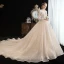 Chic / Beautiful Champagne See-through Lace Wedding Dresses 2020 A-Line / Princess V-Neck Long Sleeve Backless Glitter Tulle Beading Pearl Chapel Train Ruffle