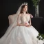 Abordable Ivoire Robe De Mariée 2020 Princesse De l'épaule Manches Courtes Dos Nu Glitter Appliques En Dentelle Chapel Train Volants