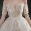 Abordable Ivoire Robe De Mariée 2020 Princesse De l'épaule Manches Courtes Dos Nu Glitter Appliques En Dentelle Chapel Train Volants