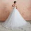 Chic / Belle Ivoire Transparentes Robe De Mariée 2020 Robe Boule Encolure Dégagée Sans Manches Appliques En Dentelle Chapel Train Volants