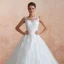 Chic / Belle Ivoire Transparentes Robe De Mariée 2020 Robe Boule Encolure Dégagée Sans Manches Appliques En Dentelle Chapel Train Volants