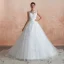 Chic / Belle Ivoire Transparentes Robe De Mariée 2020 Robe Boule Encolure Dégagée Sans Manches Appliques En Dentelle Chapel Train Volants