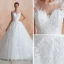 Chic / Belle Ivoire Transparentes Robe De Mariée 2020 Robe Boule Encolure Dégagée Sans Manches Appliques En Dentelle Chapel Train Volants