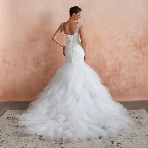Luxury / Gorgeous Ivory Wedding Dresses 2020 Trumpet / Mermaid V-Neck Sleeveless Backless Beading Chapel Train Ruffle