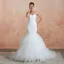 Luxury / Gorgeous Ivory Wedding Dresses 2020 Trumpet / Mermaid V-Neck Sleeveless Backless Beading Chapel Train Ruffle