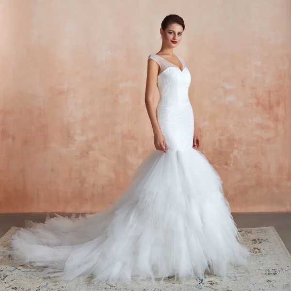 Luxury / Gorgeous Ivory Wedding Dresses 2020 Trumpet / Mermaid V-Neck Sleeveless Backless Beading Chapel Train Ruffle