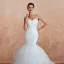 Luxury / Gorgeous Ivory Wedding Dresses 2020 Trumpet / Mermaid V-Neck Sleeveless Backless Beading Chapel Train Ruffle