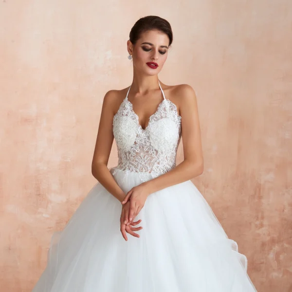 Illusion Ivory Wedding Dresses 2020 Ball Gown Halter Backless Sleeveless Appliques Lace Court Train Ruffle