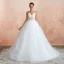 Illusion Ivory Wedding Dresses 2020 Ball Gown Halter Backless Sleeveless Appliques Lace Court Train Ruffle