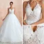 Illusion Ivory Wedding Dresses 2020 Ball Gown Halter Backless Sleeveless Appliques Lace Court Train Ruffle