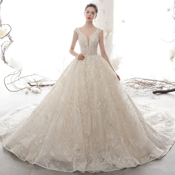 Luxury Gorgeous Champagne See Through Wedding Dresses 2020 Ball Gown Deep V Neck Sleeveless Backless Glitter Tulle Appliques Lace Sequins Beading Cathedral Train Ruffle