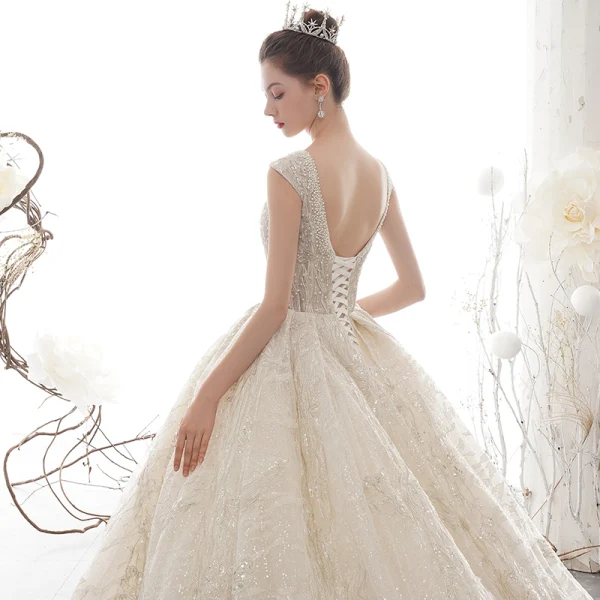 Luxury / Gorgeous Champagne See-through Wedding Dresses 2020 Ball Gown Deep V-Neck Sleeveless Backless Glitter Tulle Appliques Lace Sequins Beading Cathedral Train Ruffle