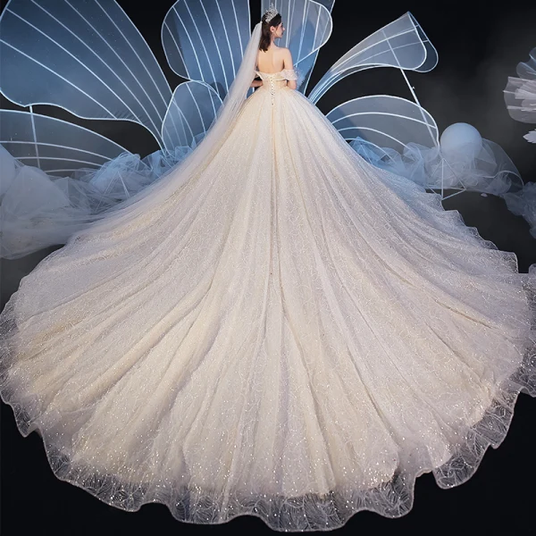 Elegant Champagne Wedding Dresses 2020 Ball Gown Off-The-Shoulder Short Sleeve Backless Beading Glitter Tulle Cathedral Train Ruffle