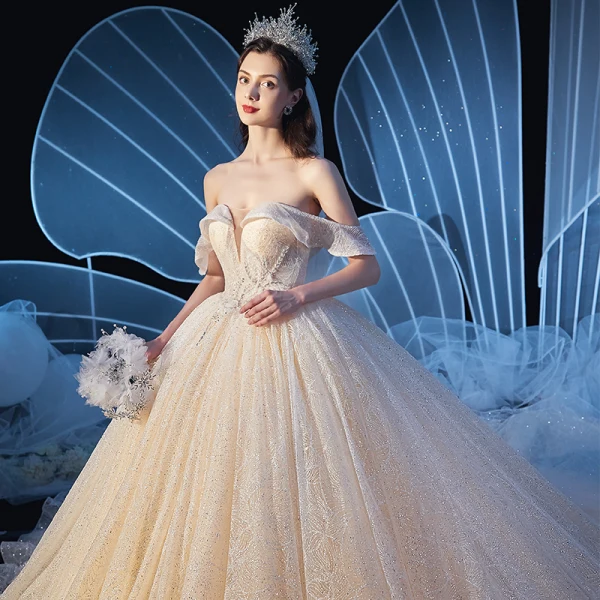Elegant Champagne Wedding Dresses 2020 Ball Gown Off-The-Shoulder Short Sleeve Backless Beading Glitter Tulle Cathedral Train Ruffle