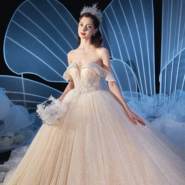 Elegant Champagne Wedding Dresses 2020 Ball Gown Off-The-Shoulder Short Sleeve Backless Beading Glitter Tulle Cathedral Train Ruffle