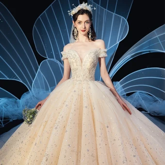 Scintillantes Champagne Robe De Mariée 2020 Robe Boule De L 039 Épaule Transparentes V Cou Manches Courtes Dos Nu Perlage Glitter Paillettes Tulle Cathedral Train Volants