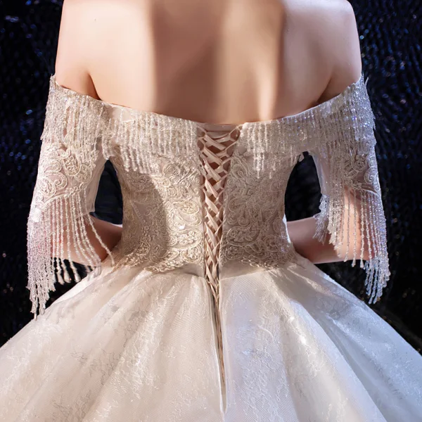 Luxury / Gorgeous Champagne Wedding Dresses 2020 Ball Gown Off-The-Shoulder Short Sleeve Backless Appliques Lace Beading Tassel Cathedral Train Ruffle