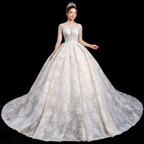 Charmant Champagne Transparentes Robe De Mariée 2020 Robe Boule Encolure Dégagée 3/4 Manches Dos Nu Appliques En Dentelle Perlage Royal Train Volants