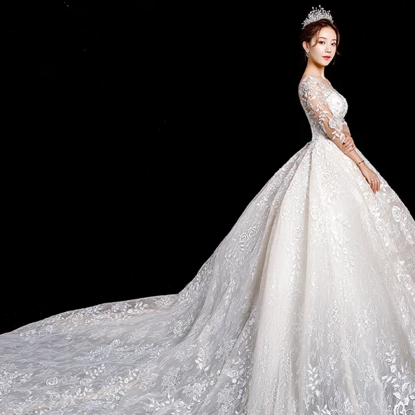 Charmant Champagne Transparentes Robe De Mariée 2020 Robe Boule Encolure Dégagée 3/4 Manches Dos Nu Appliques En Dentelle Perlage Royal Train Volants
