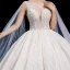 High-end Champagne Wedding Dresses 2020 Ball Gown Deep V-Neck Sleeveless Backless Appliques Lace Sequins Beading Watteau Train Ruffle